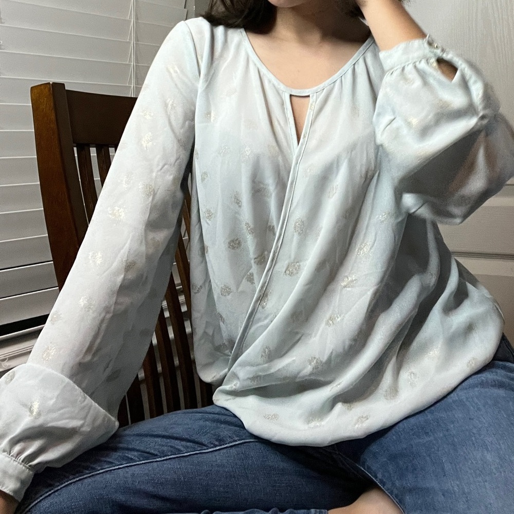 Blue and gold blouse.